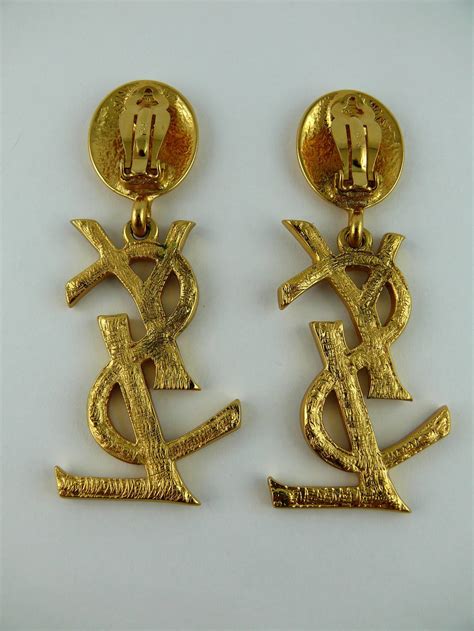 ysl ohringe|YSL earrings.